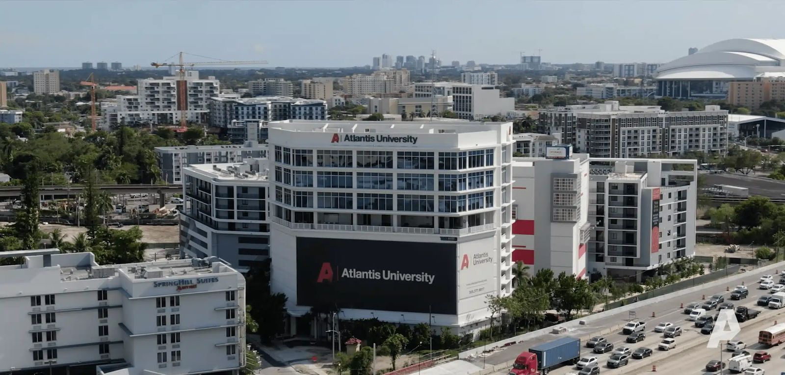 Aerial view of the Atlantis University building at AU University Park, Miami, on a sunny day