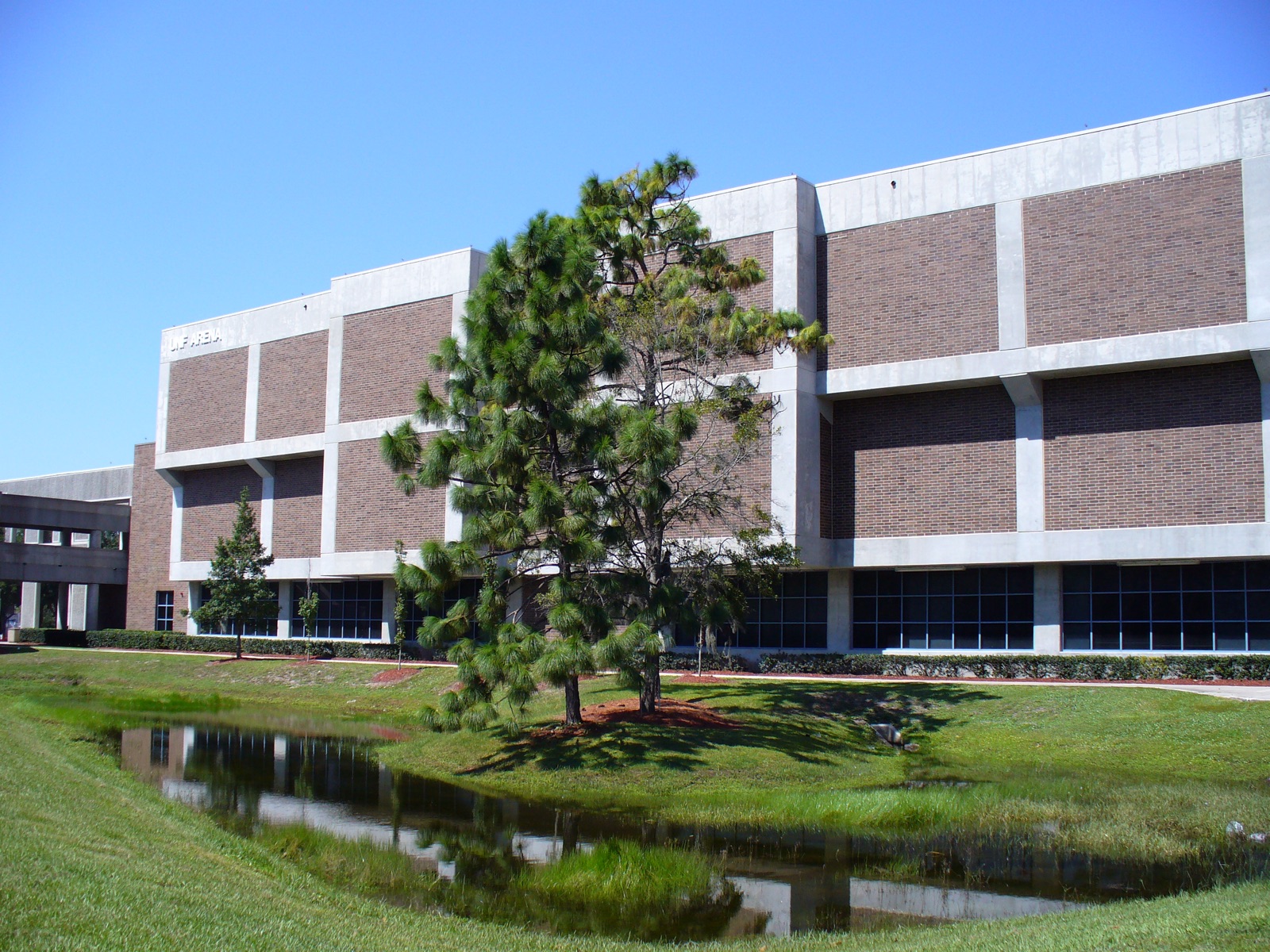 UNF Arena, the University of North Florida's sports arena, next to a campus pond