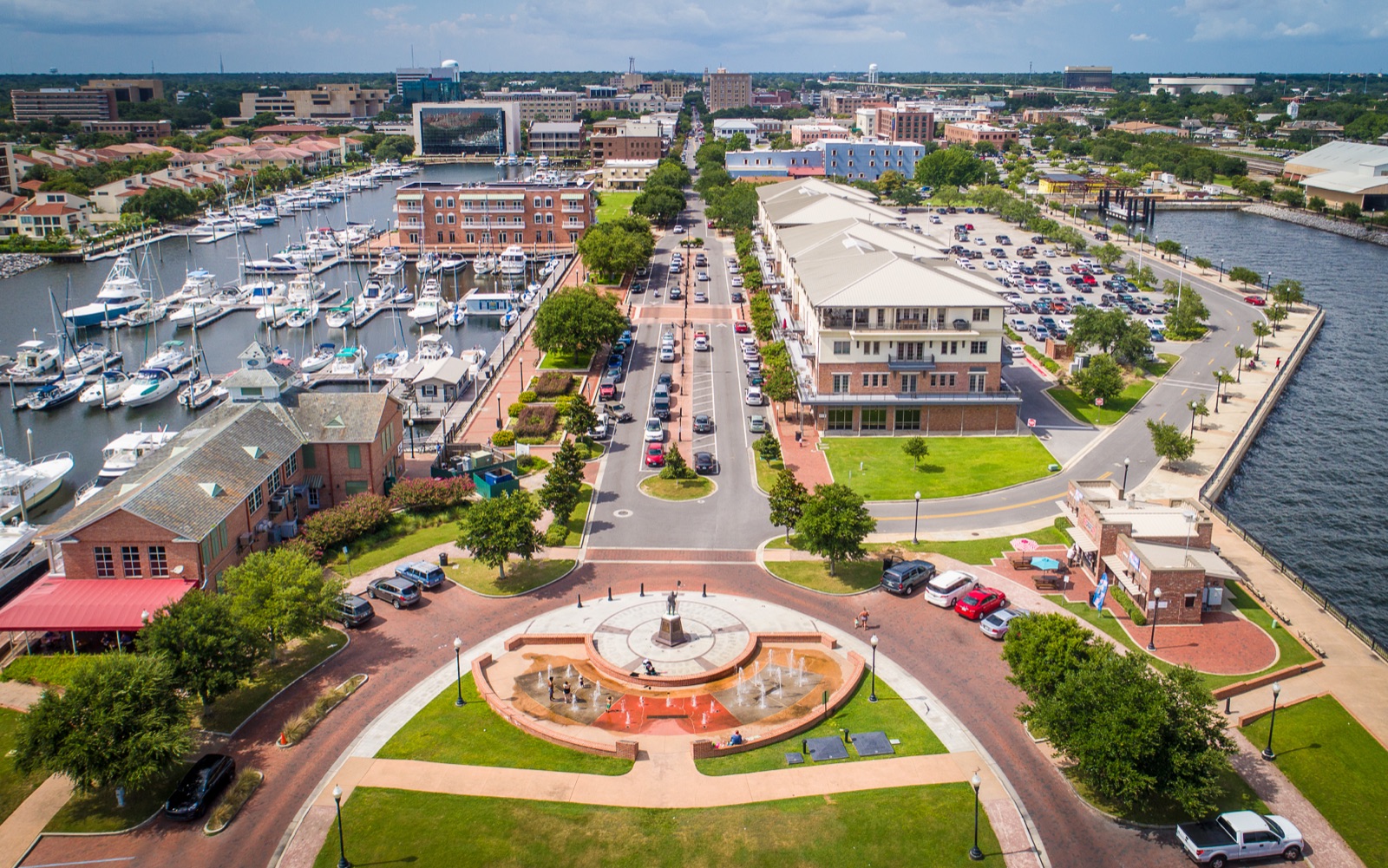 Aerial view of Plaza de Luna and Palafox Pier in downtown Pensacola, with the marina, Palafox Street and the bay